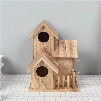 Houten doe-het-vogelhuis